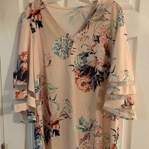Never worn. V neck peach blouse
